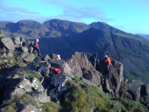 Team members at the top of Needle Ridge