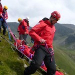 Lingmel Nose and sledging the casualty back down to the valley bottom