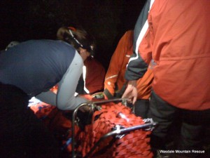 The casualty is given a last check by one of the team doctors before the descent begins