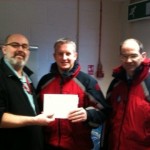 Mike and Paul receiving the donation from the B500 team