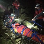 About to lift the stretcher over the narrow bridge almost at Brackenclose