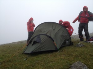 Team members outside the casualties' tent