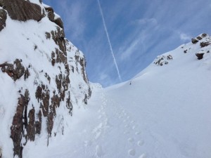 Final approach to the summit ridge. In summer this is a narrow gully but the right hand side in the picture is fully banked out. 