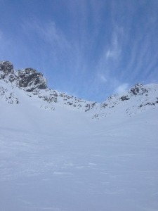 Approach to Mickledore. Many of the normal rock features are buried under snow and close examination of the surface shows a lot of wind blown snow