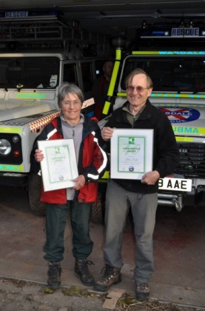 John and Sue with their certificates