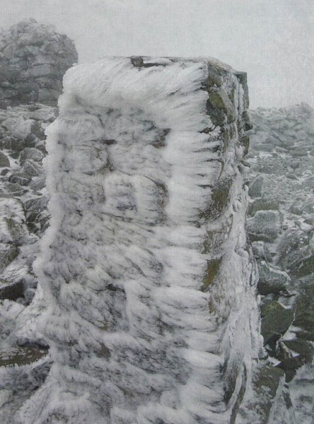 Summit of Scafell Pike with the Trig point covered in ice - John and Allan loved to go out when there was snow around