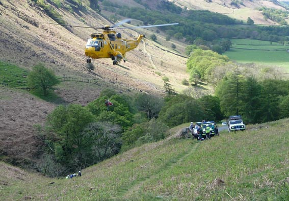The casualty being winched into the helicopter
