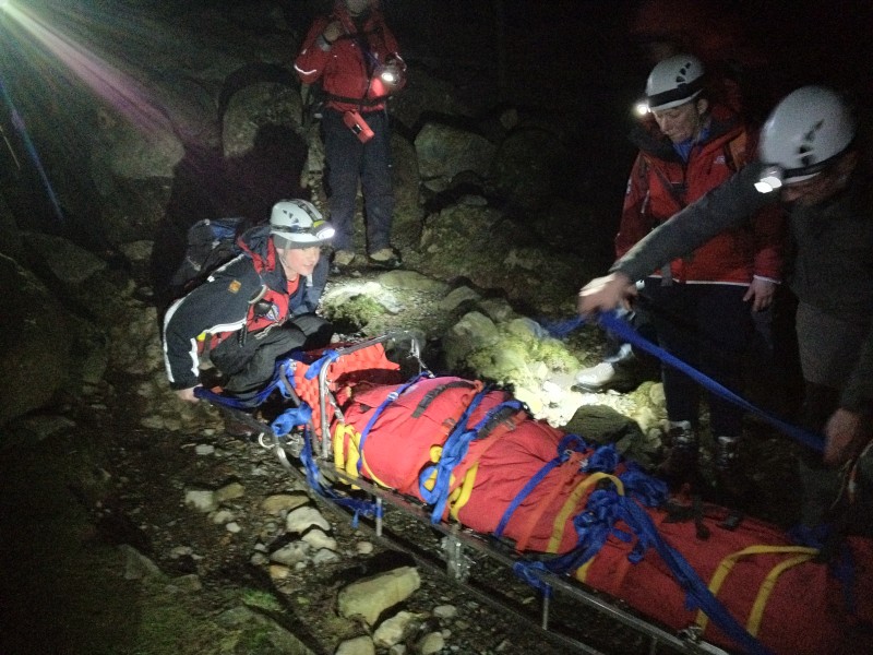 About to lift the stretcher over the narrow bridge almost at Brackenclose