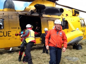 Casualties on the helicopter, team members retire to a safe distance